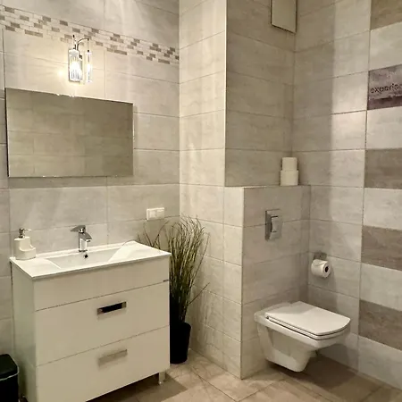 Two Triton Park Апартаменты
