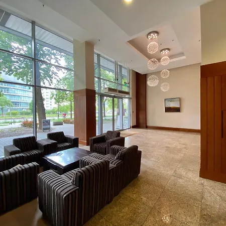 Two Triton Park Апартаменты
